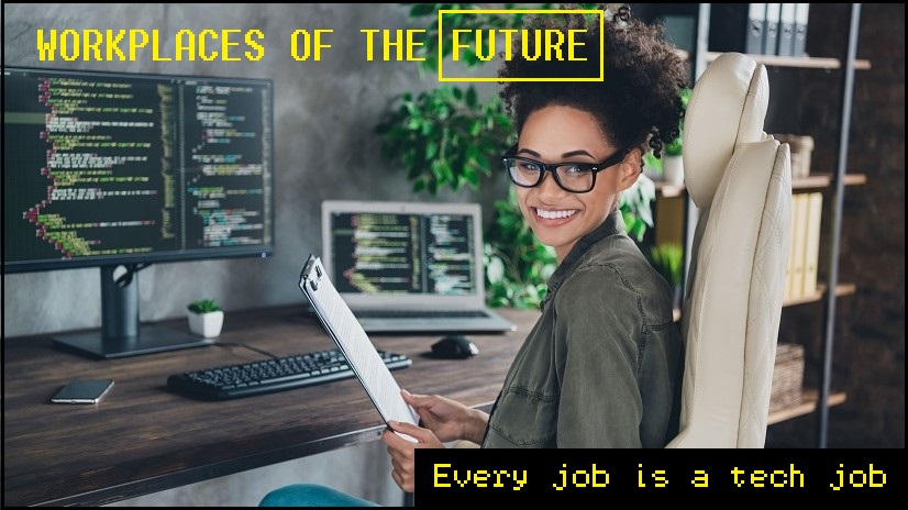 Woman sitting at a computer, smiling to camera